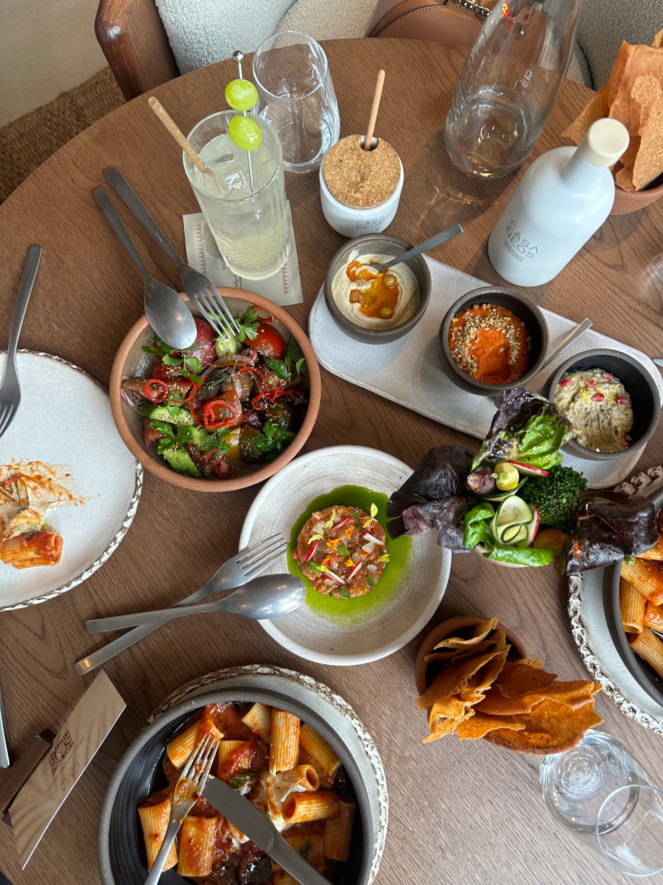 CASA NEOS — the corner table, right as the plates land
